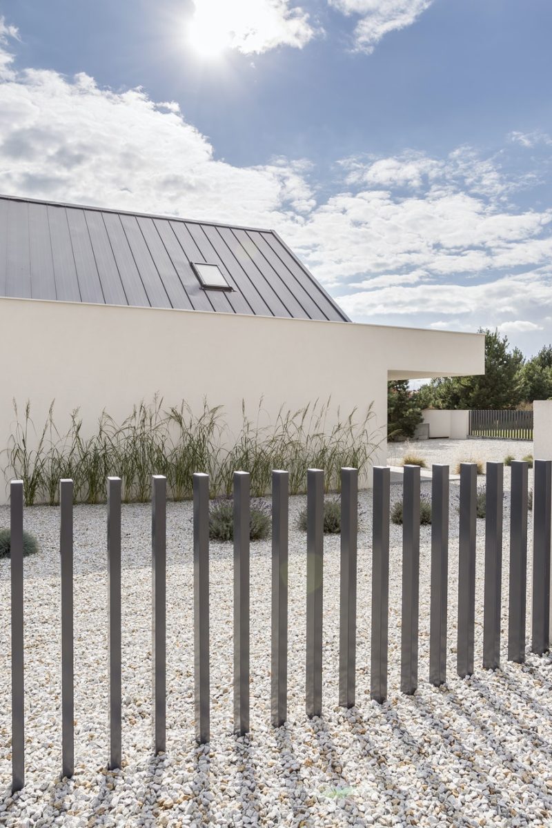 Fence of spacious white house